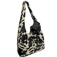Bolsa hobo em couro legítimo animal print vaca preta e off-white