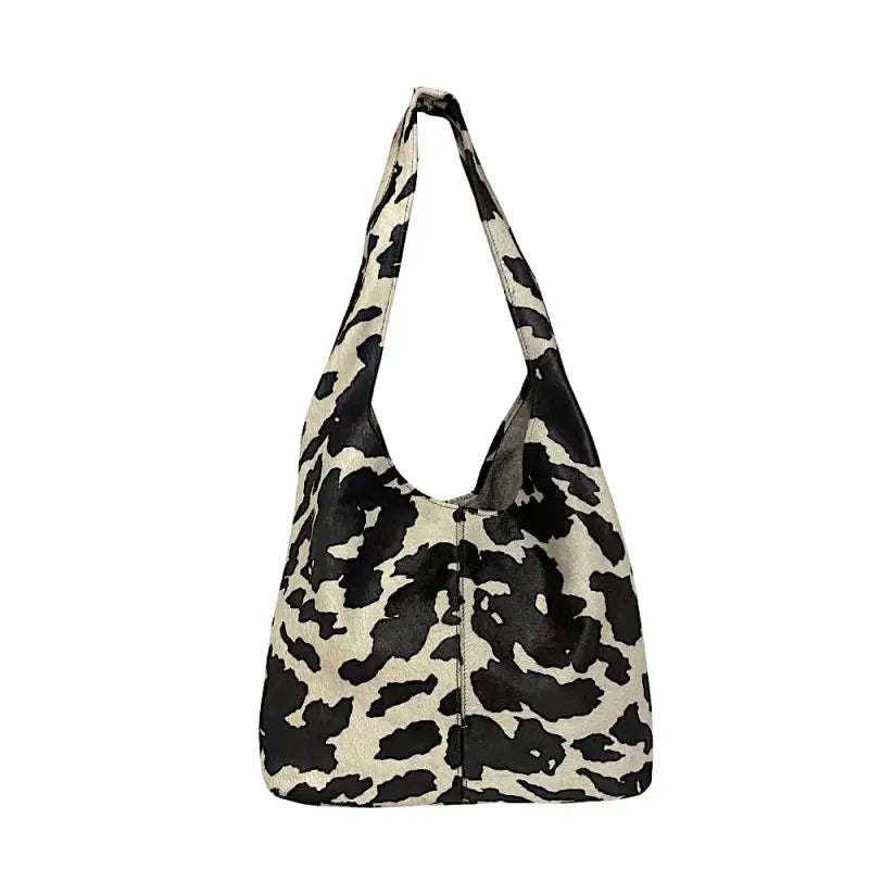 Bolsa hobo em couro legítimo animal print vaca preta e off-white