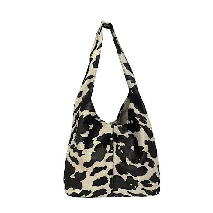 Bolsa hobo em couro legítimo animal print vaca preta e off-white
