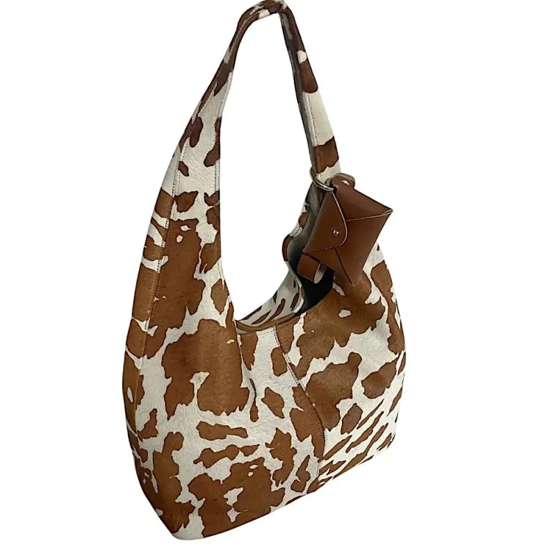 Bolsa hobo em couro legítimo animal print vaca | caramelo e off-white