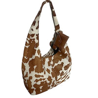Bolsa hobo em couro legítimo animal print vaca | caramelo e off-white