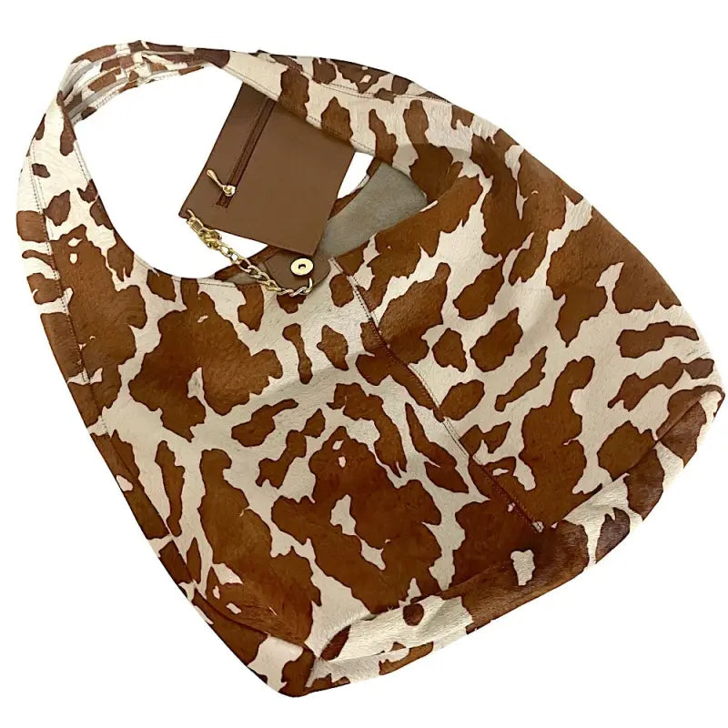 Bolsa hobo em couro legítimo animal print vaca | caramelo e off-white