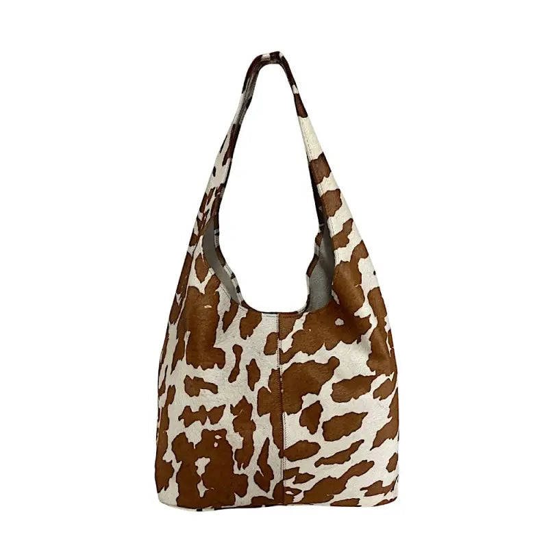 Bolsa hobo em couro legítimo animal print vaca | caramelo e off-white