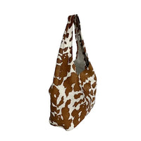 Bolsa hobo em couro legítimo animal print vaca | caramelo e off-white