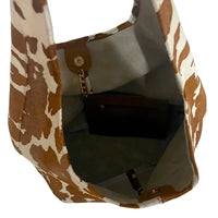 Bolsa hobo em couro legítimo animal print vaca | caramelo e off-white