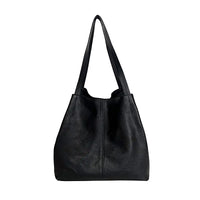 Bolsa Shopper Preta em Couro Legítimo Floater com ajuste lateral e alças de ombro confortáveis