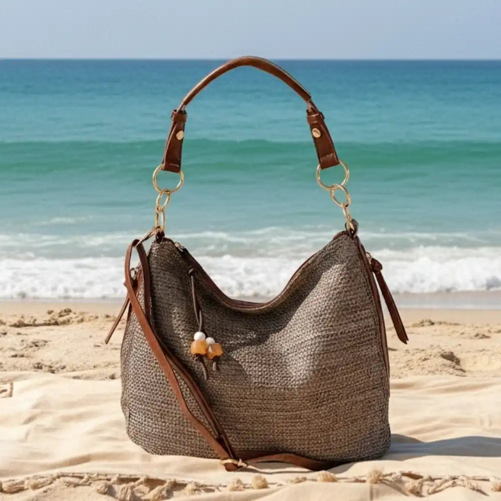 Bolsa hobo em fibra sintética marrom e couro vegano