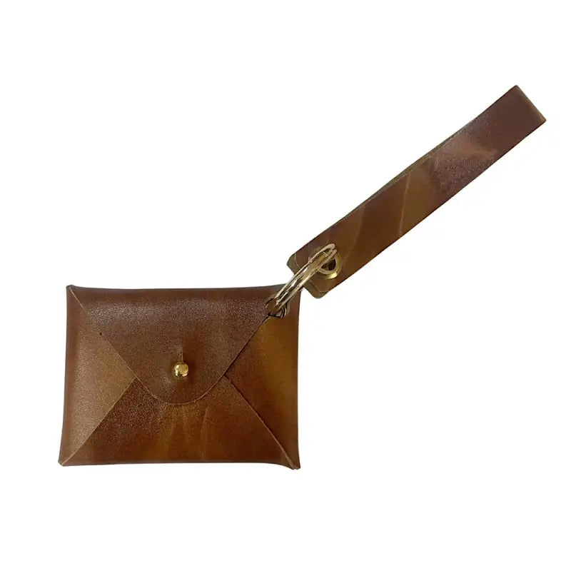 Carteira de pulso couro caramelo liso pátina natural e ferragem dourada