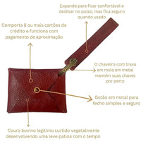 Carteira de pulso vermelha em couro legítimo ferragem ouro velho, com detalhes técnicos